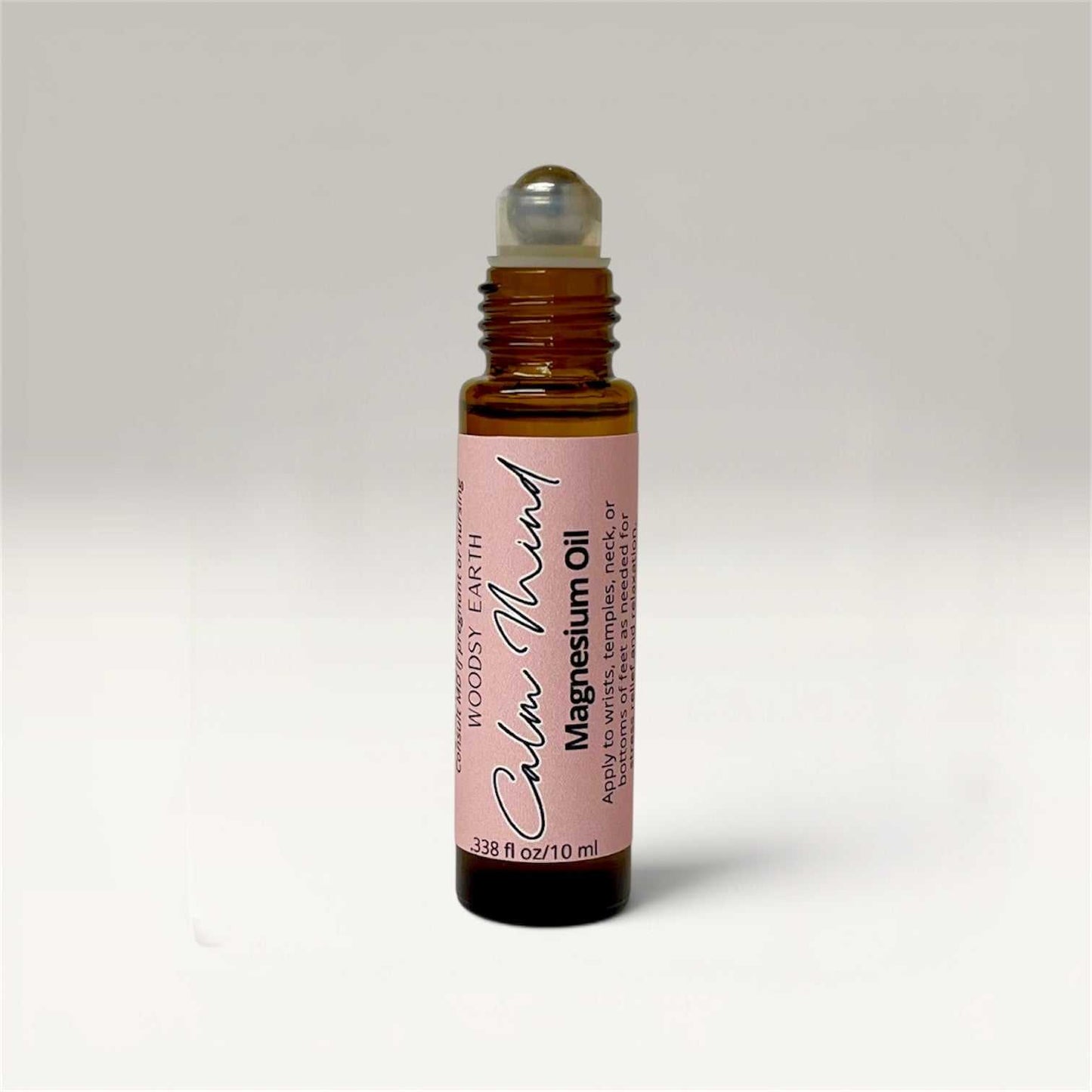 Set of three 10ml magnesium oil roll-ons with essential oil blends for calm mind, deep sleep, and breathe easy benefits