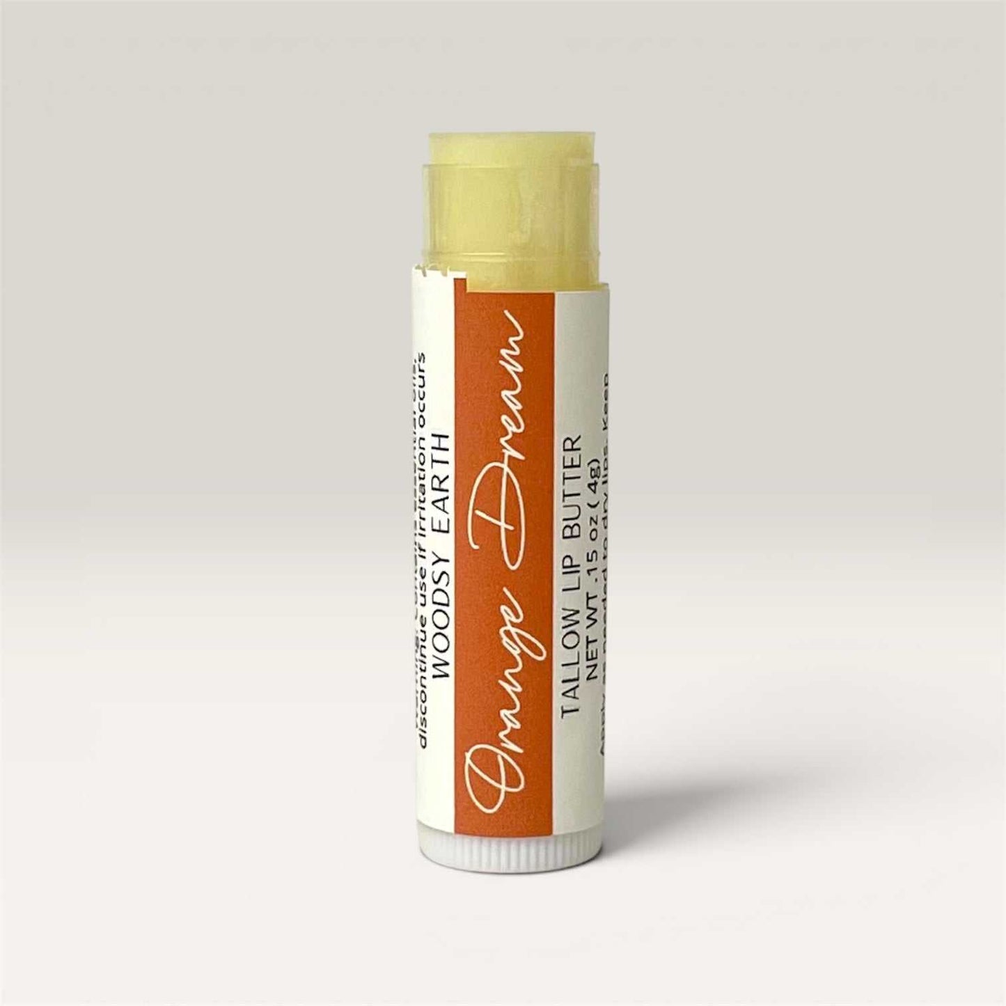 Orange Dream Lip Butter jar with orange and vanilla scent, nourishing lip care balm container