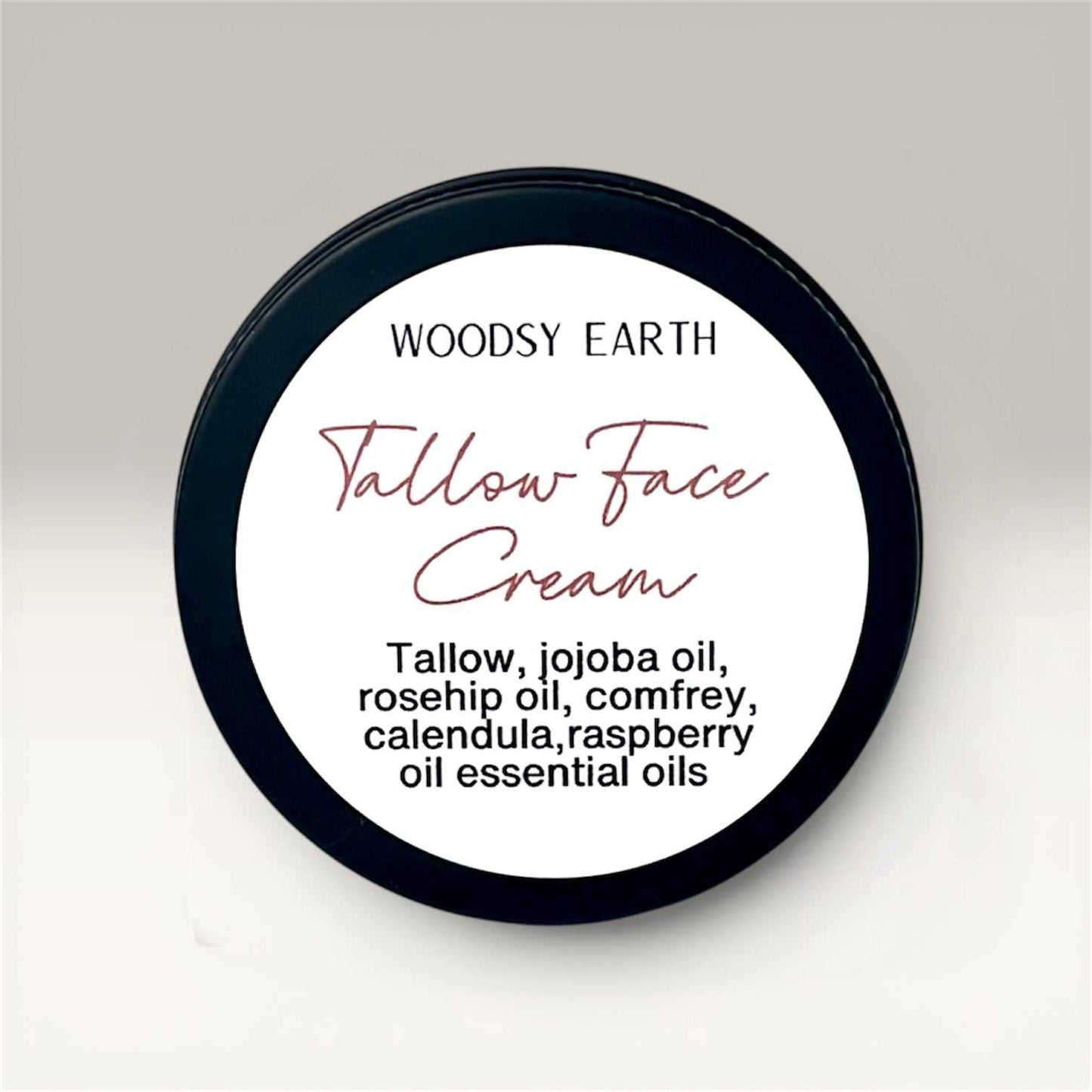 Whipped tallow face cream in a travel tin with nourishing herbal oils for balanced skin