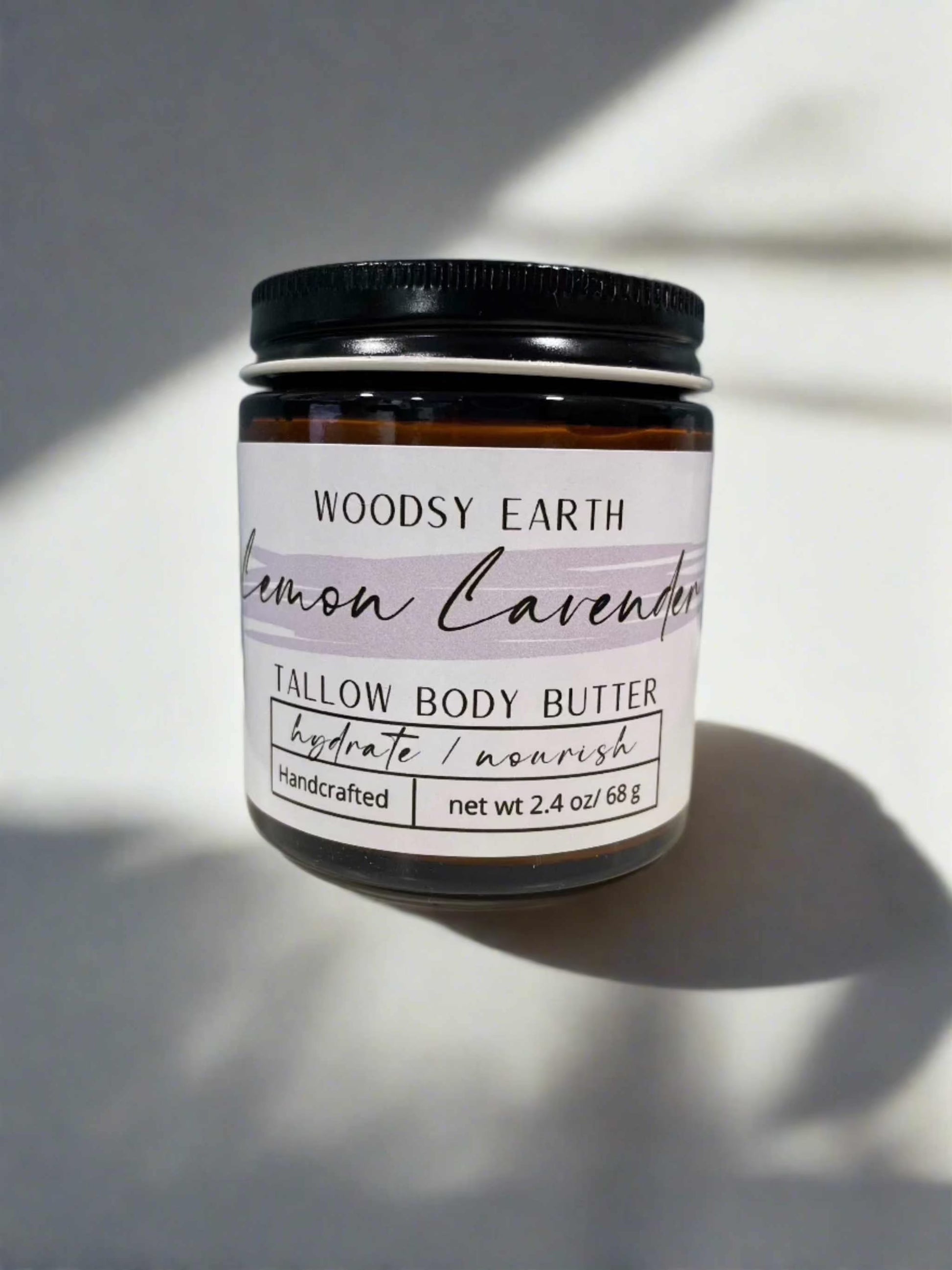 Lemon Lavender Whipped Body Butter jar with essential oils for moisturizing skin.