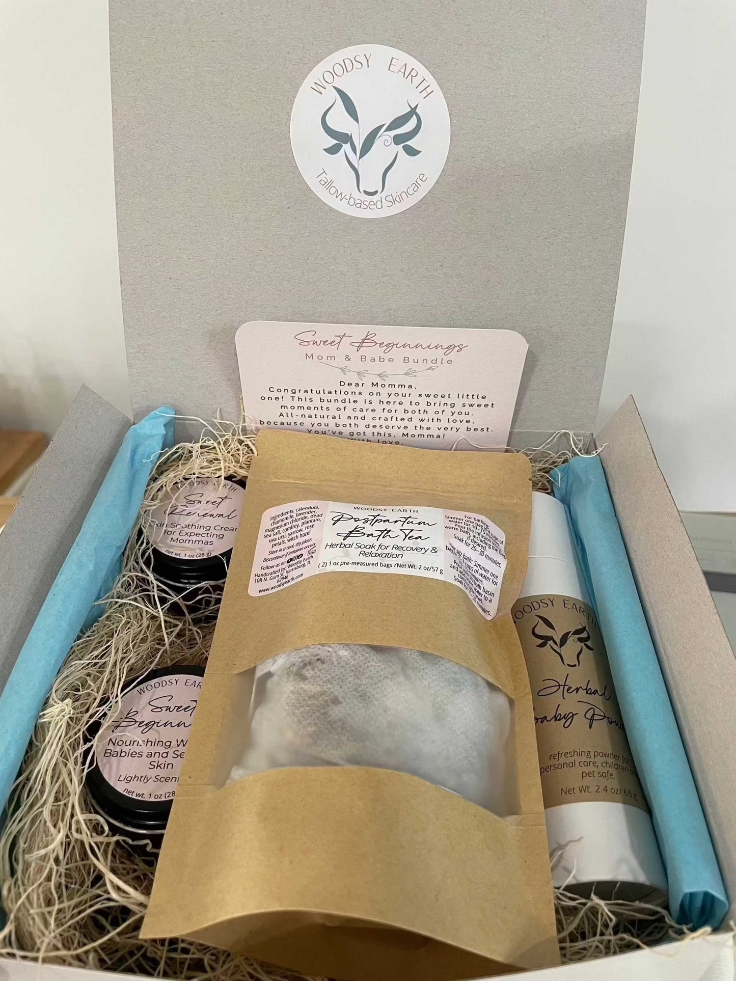 Woodsy Earth Sweet Beginnings Mom & Babe Gift Set with natural postpartum care products, herbal sitz bath, balm, and baby wellness items