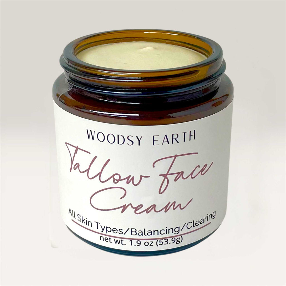 Woodsy Earth grass-fed tallow face cream with calendula and comfrey