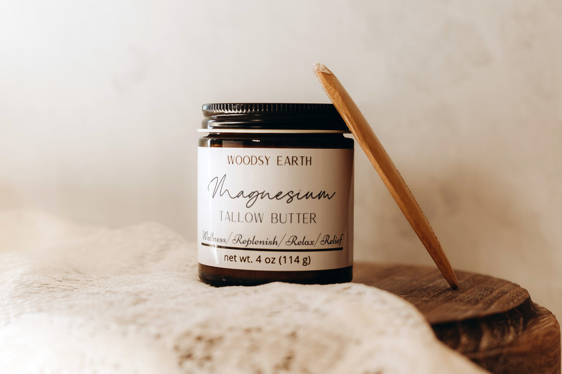 An eco-friendly jar of magnesium tallow butter made with grass-fed tallow, magnesium oil, shea butter, beeswax, and essential oils. This creamy butter soothes and hydrates the skin, offering natural pain relief