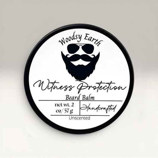 2oz tin of handcrafted beard balm with nourishing ingredients and medium hold for refined grooming