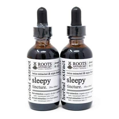 Roots Apothecary Sleepy tincture bottles for sleep support with organic herbs.