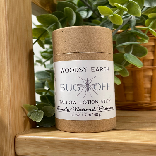 Woodsy Earth Bug Off Bar displayed on a wooden surface, designed for natural insect repellent protection