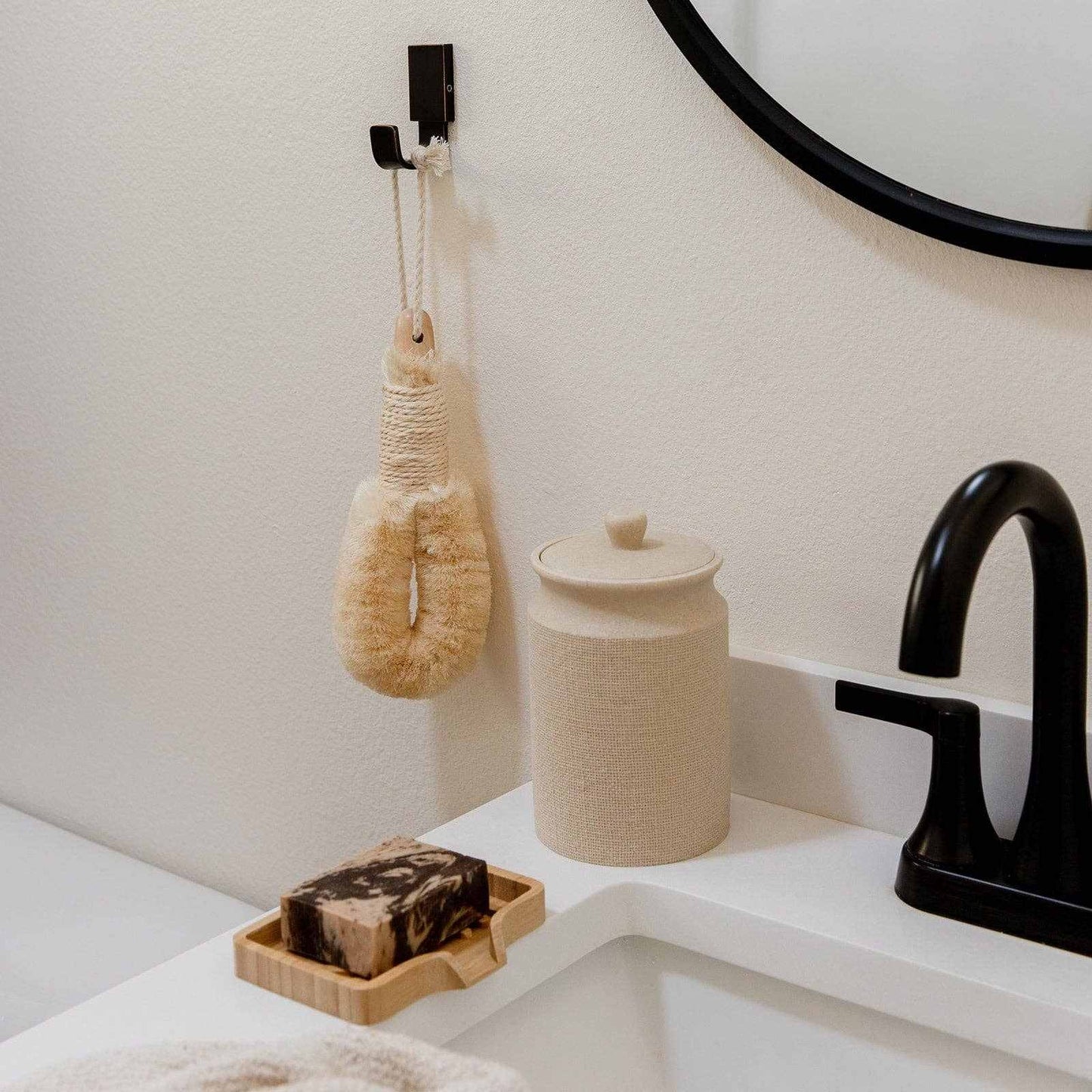 Earth Ahead Vegan Dry Brush with agave sisal bristles for exfoliating and boosting skin circulation, displayed in a minimalist bathroom setting.