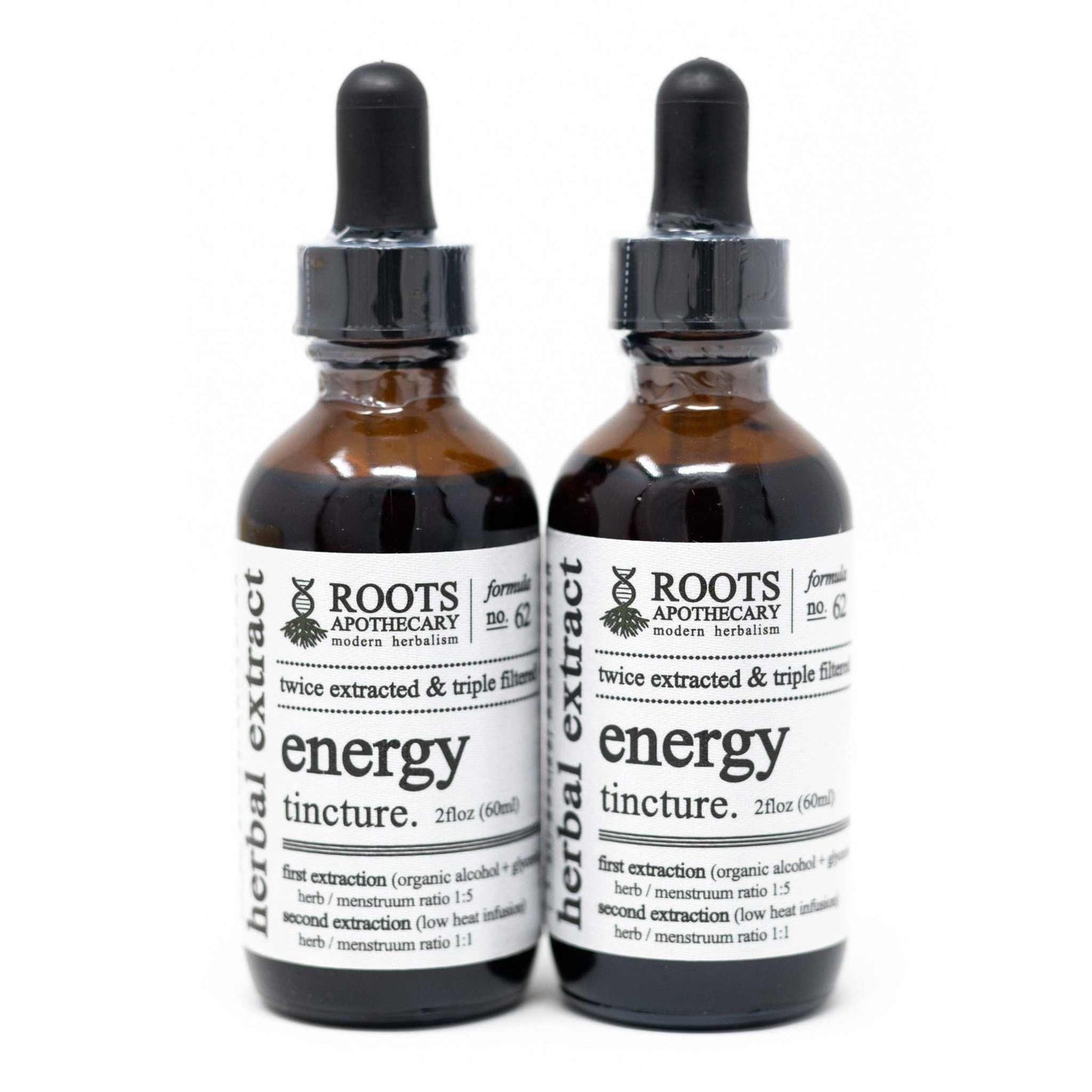 Roots Apothecary Energy Tincture in amber glass bottles, organic herbal extract blend for natural focus, stamina, and vitality support