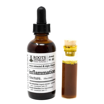 Roots Apothecary Inflammation Tincture full-size dropper bottle with sample vial containing turmeric and organic botanical blend