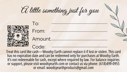 Woodsy Earth gift card back featuring QR code, customizable fields for to/from/amount/code, and redemption instructions