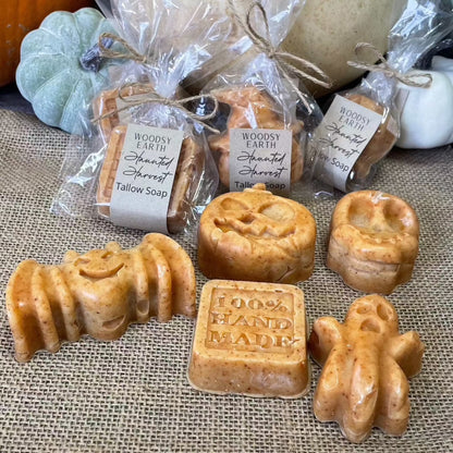Woodsy Earth Haunted Harvest Tallow Soap, handcrafted with turmeric and essential oils, shaped into festive fall and Halloween designs like pumpkins, bats, and ghosts