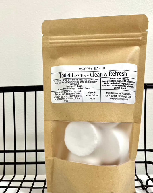 Woodsy Earth Toilet Fizzies in eco-friendly kraft packaging, made with baking soda and essential oils for a natural clean and fresh scent.