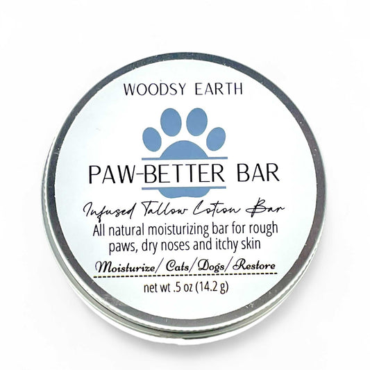 Woodsy Earth Paw Better Bar in tin container, natural moisturizing paw balm for dogs and cats with dry paws and noses.