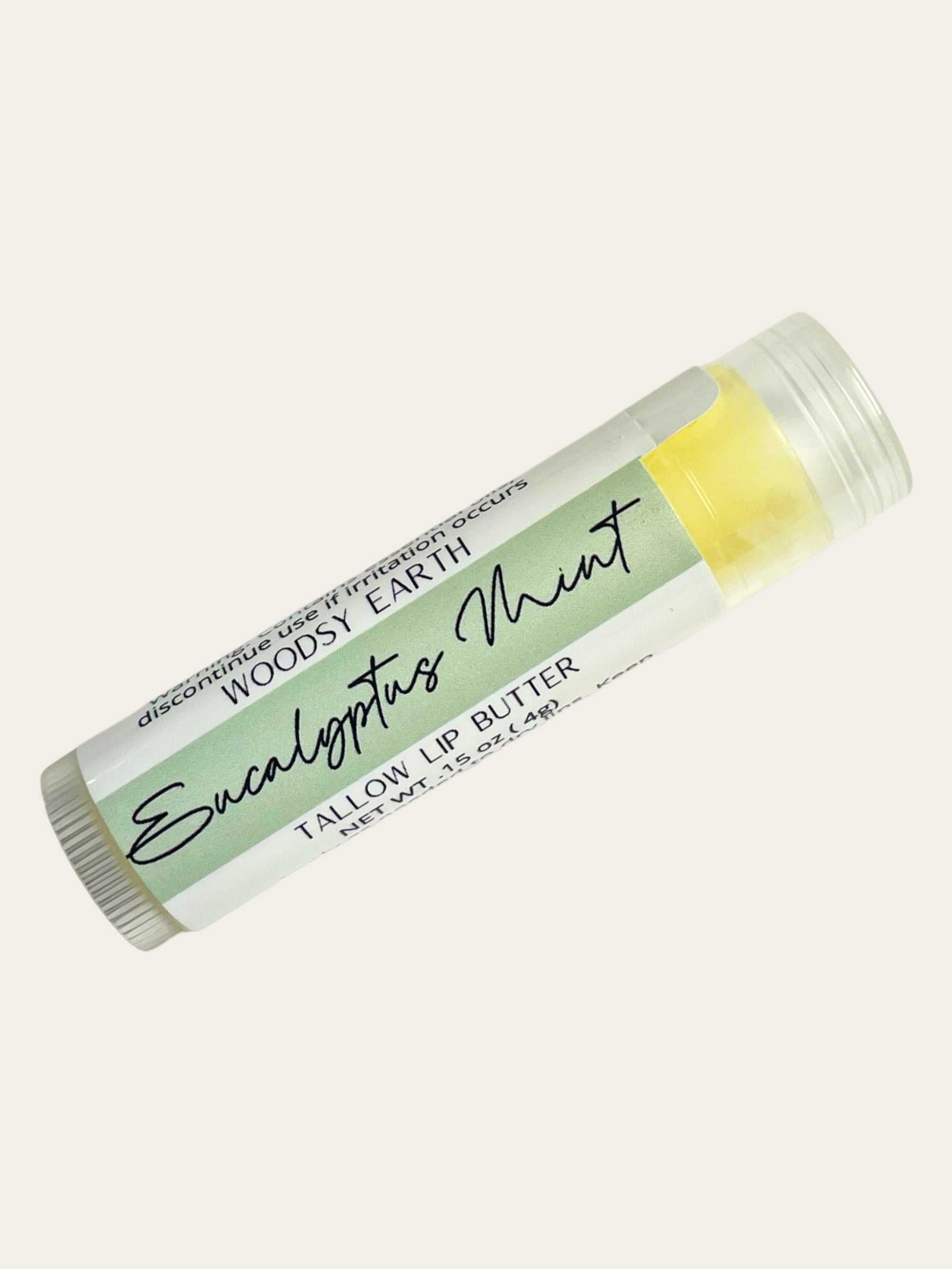 Eucalyptus Spearmint Tallow Lip Butter tube with nourishing natural ingredients.