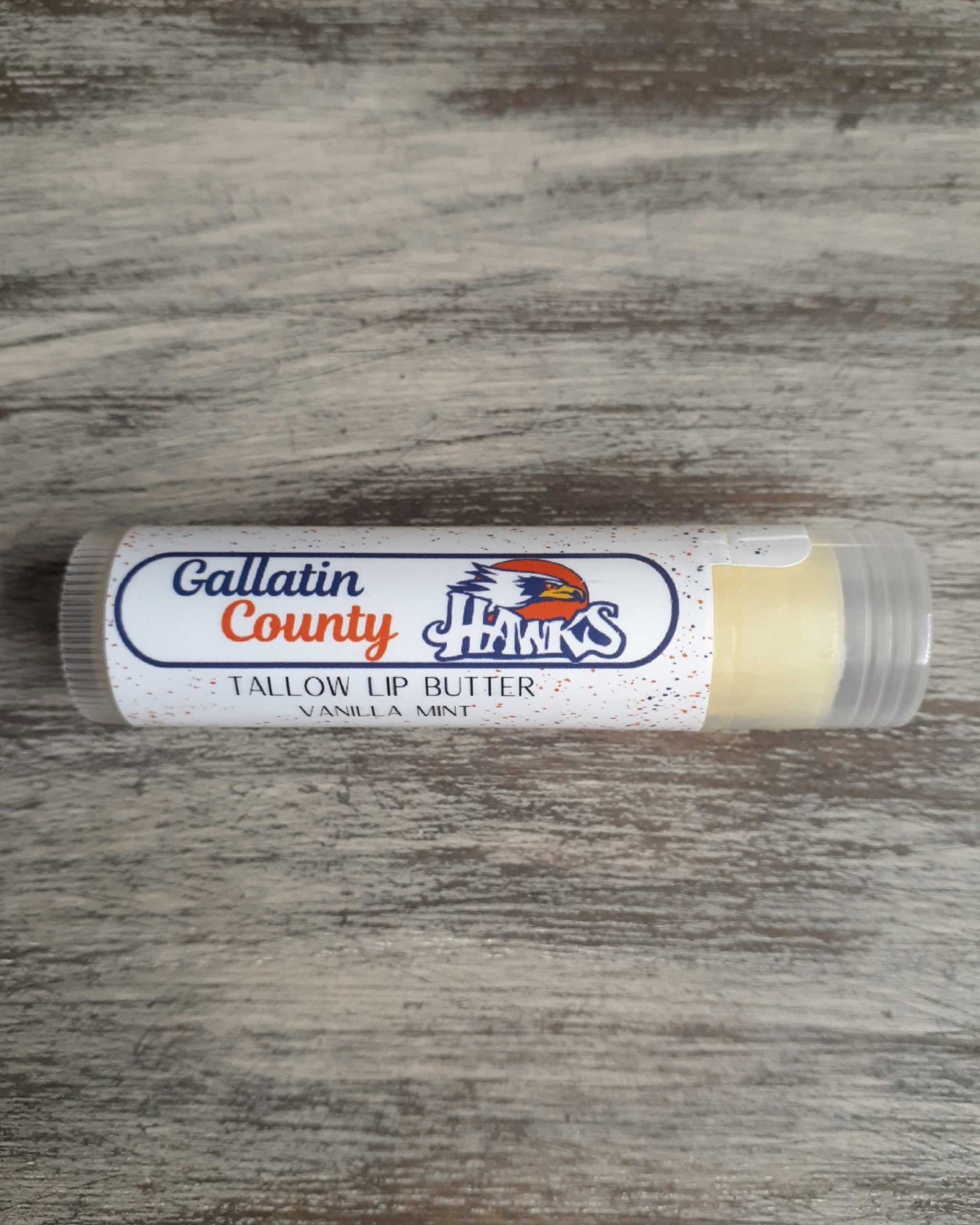 Customized vanilla mint lip butter with school mascot logo on label.