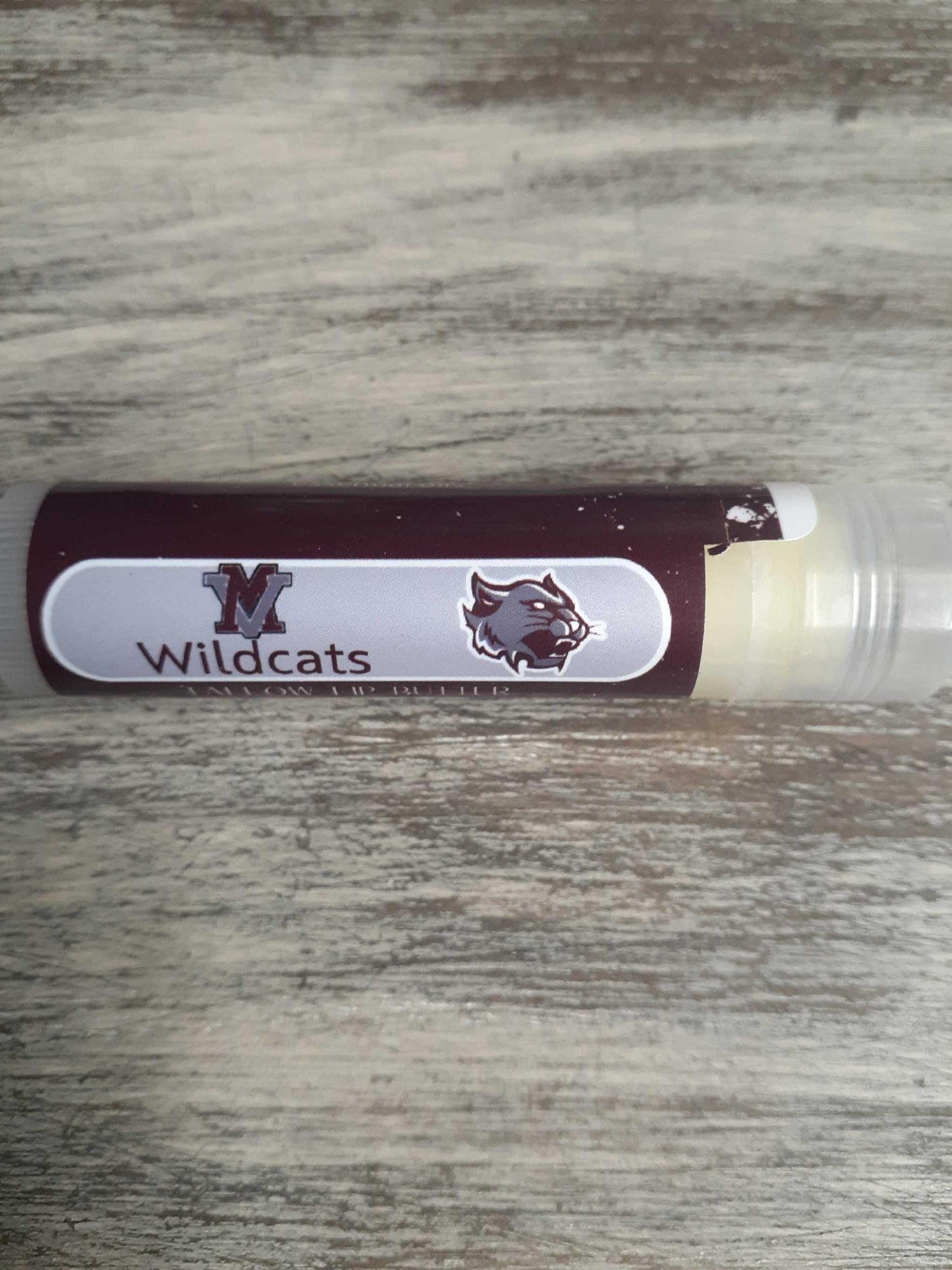 Lip butter with Wildcats design, vanilla mint scent.