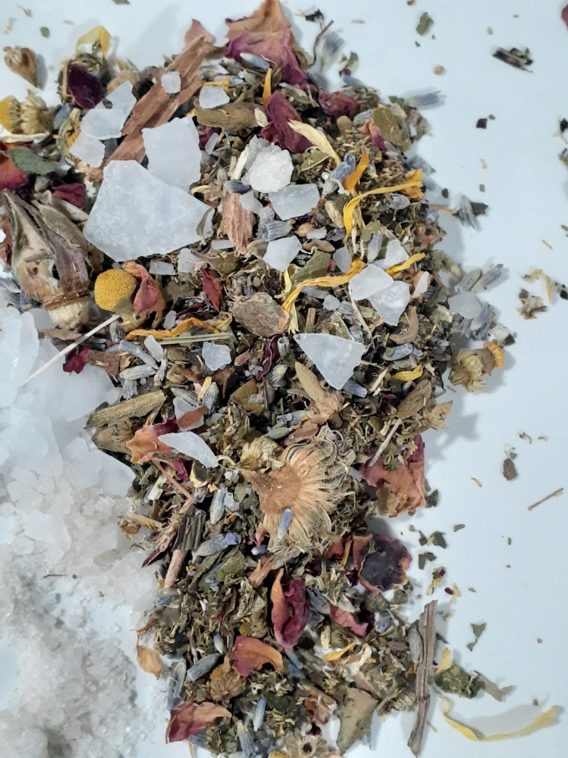 Postpartum Herbal Sitz Bath ingredients blend with lavender, chamomile, rose petals, and Dead Sea salt.