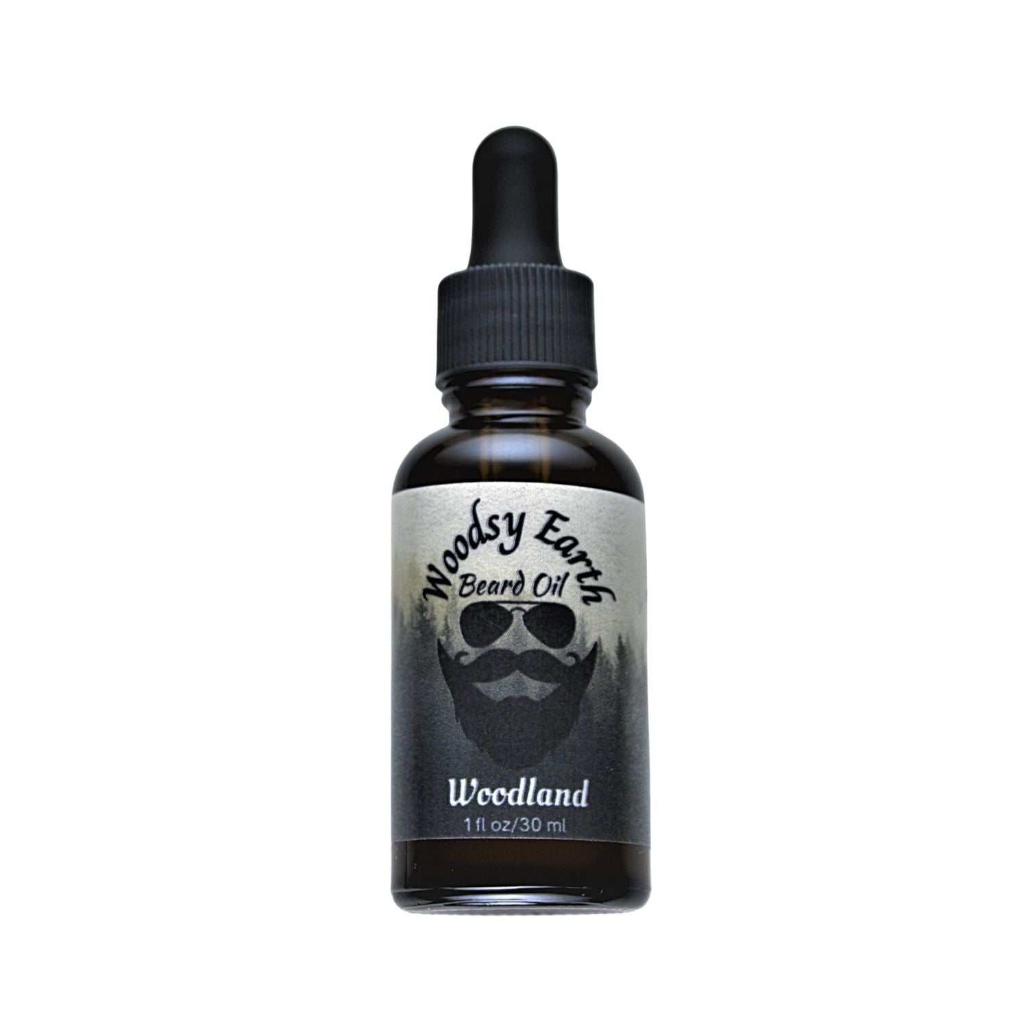 Bottle of Woodsy Earth Beard Oil with cedarwood, vetiver, and vanilla for moisturizing and softening beards.