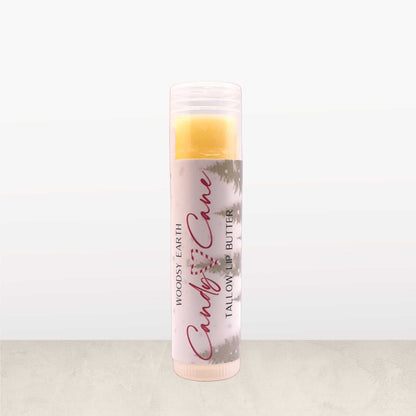 Candy Cane Tallow Lip Butter in clear tube, made with peppermint, spearmint, and vanilla oils for a festive holiday lip balm.