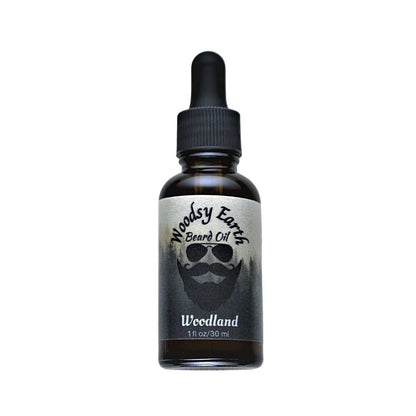 Woodsy Earth Woodland Beard Oil in amber glass dropper bottle, made with cedarwood, vetiver, and vanilla to moisturize and soften beards